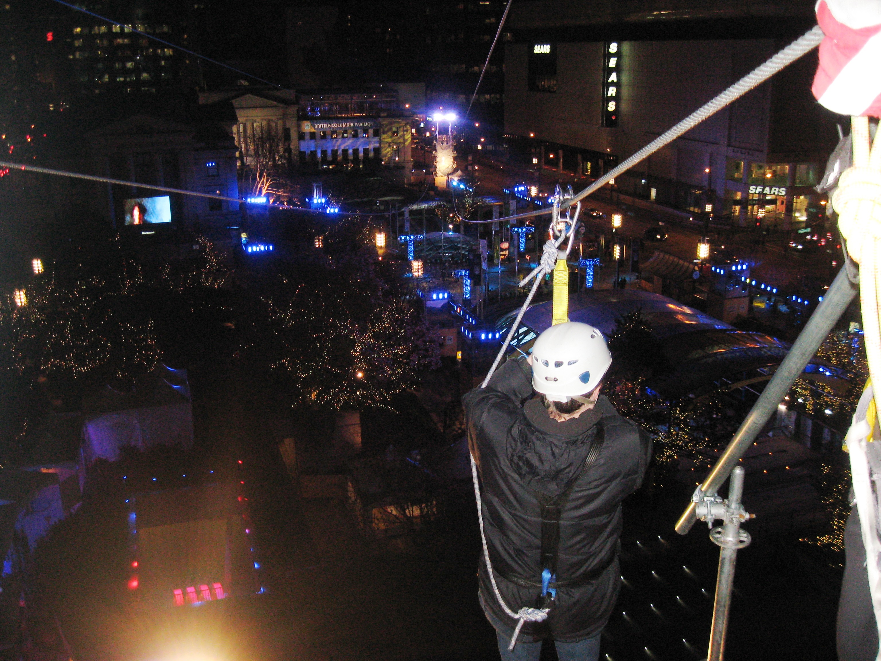 Shawn Kirkpatrick on a zipline over Robson Square